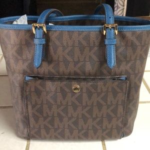 Michael Kors small purse.Brown with Blue trim